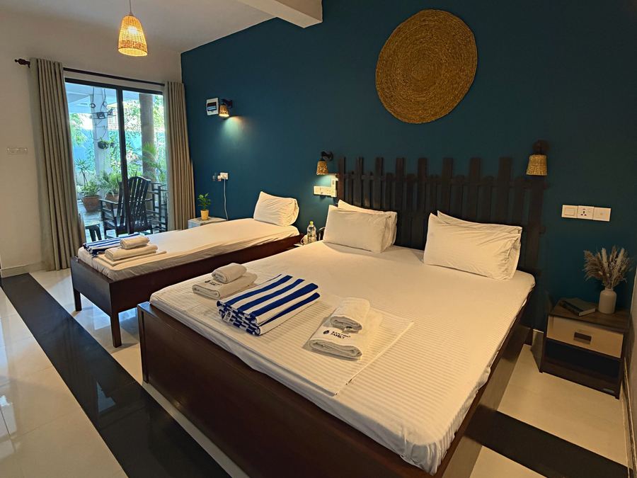Triple room — a king bed and a single, Santino Boutique