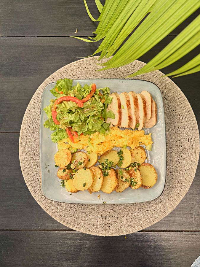 Chicken with potatoes and salad